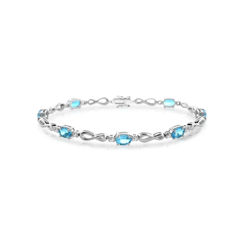 Blue Topaz Infinity 7.5-inch Bracelet in Sterling Silver