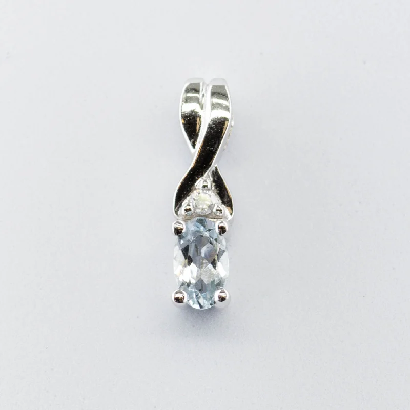 10k White Gold Oval Aquamarine Pendant | 0.16ctw